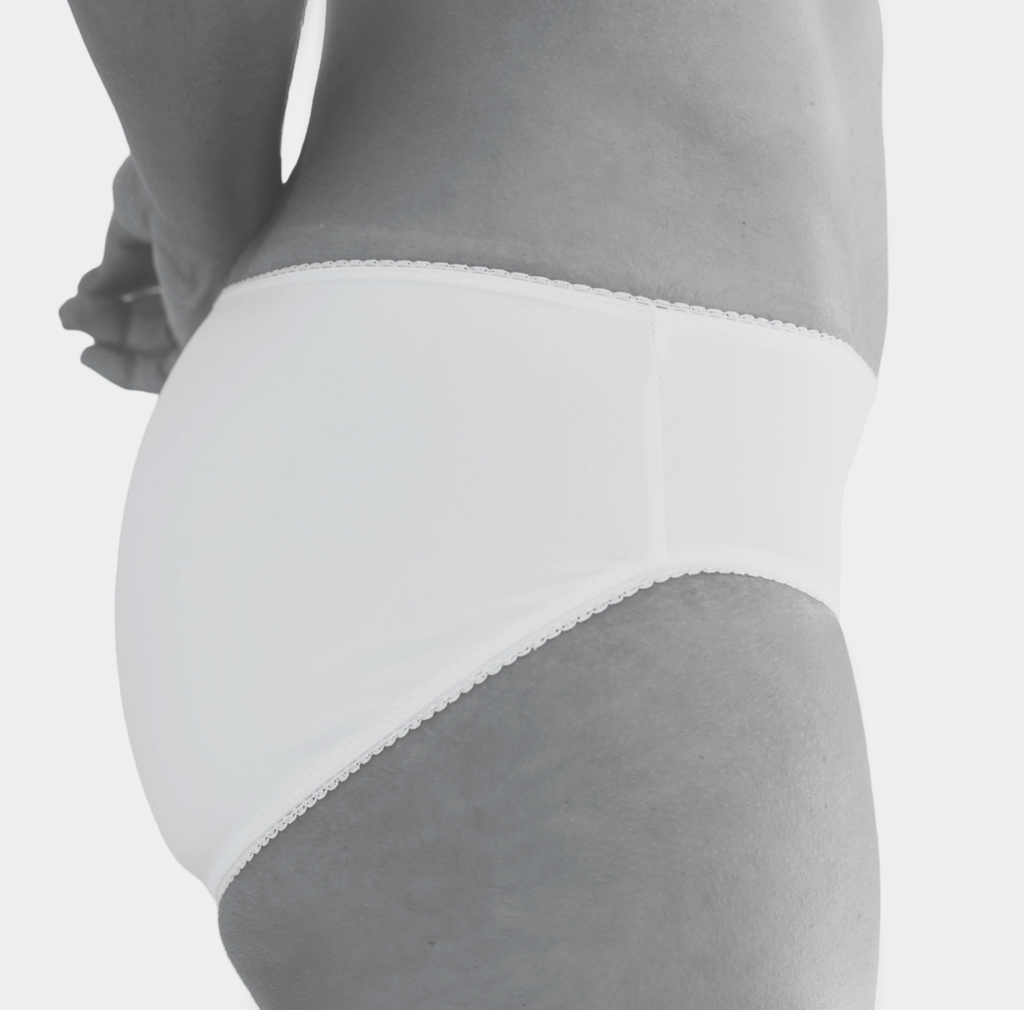 Plain white briefs and underwear made from regenerated nylon perfect for the beach.  With matching lace trim and spf protection these are the perfect lifestyle briefs and underwear.  Pair with plain white bralette - both available from our Basik Collection.